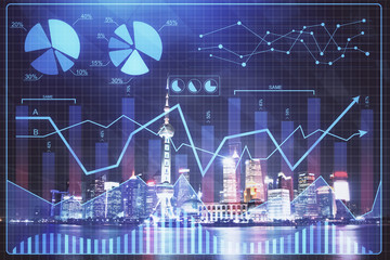 Financial graph on night city scape with tall buildings background multi exposure. Analysis concept.