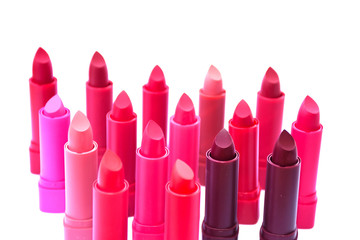 Lipstick colors arranged on a white background.