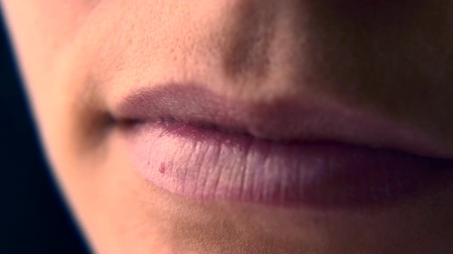 Close-up Woman Lips Teeth. Macro Female Human Mouth. Open Closed. Slow motion 0.5 real time speed 60p