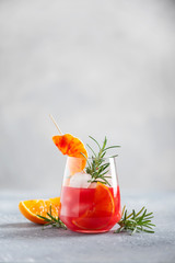Cocktail with red oranges