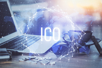 Double exposure of blockchain theme hologram and table with computer background. Concept of bitcoin...