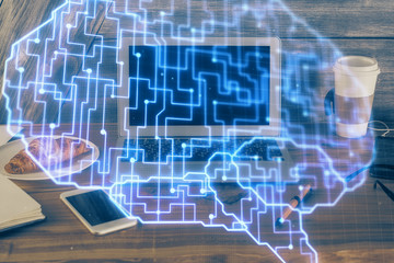 Multi exposure of work table with computer and brain hologram. Brainstorm concept.