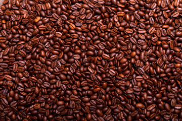 Close up of a roasted arabic coffee beans forming, organic square background