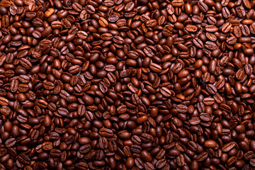 Close up of a roasted arabic coffee beans forming, organic square background