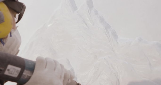 Mason artist sculpt marble relief closeup