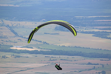 Paraglider flying from Dobrostan in Bulgaria	