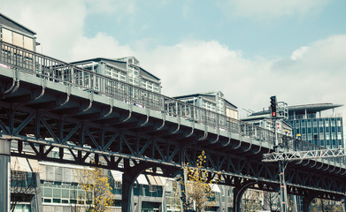 Obraz premium railway train going throw city. citylife view vintage post card. europe, germany