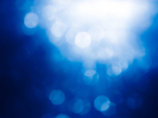 blue bokeh abstract light background.