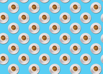 Cup of espresso coffee flat lay pattern on blue pastel color background. Pop art design concept.