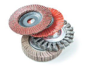 stack of abrasive tools greending flap wheels isolated on white