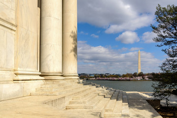Fototapeta na wymiar View of Washington Monument during Cherry Blossom from Jefferson Memorial, Washington DC, Springtime