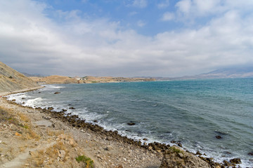Low clouds and haze over the sea bay.