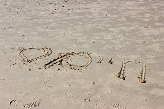 An inscription on the beach of Israel on the sand in Hebrew (translation from Hebrew - life)