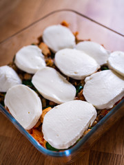 Pasta casserole with barbecue chicken breast, cheese and vegetables