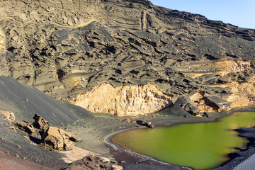 Lagoon with green water (Lago Verde) nearby El Golfo on canary island Lanzarote