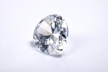 Briliant sparkling clear diamond, close up shoot on isolated background