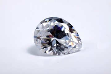 Close up shoot of shinny diamond that faceted to pear shapes isolated background