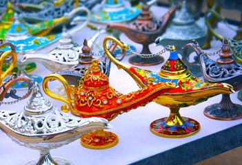 Aladdin's lamp. Souvenirs in Jordan. Colored metal products. Arab gifts.