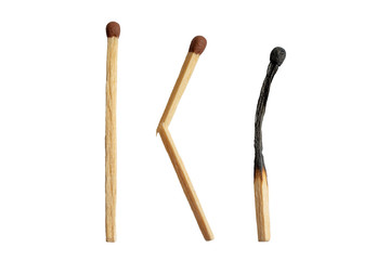 Three matches, whole, broken and burned isolated on a white background. Close up