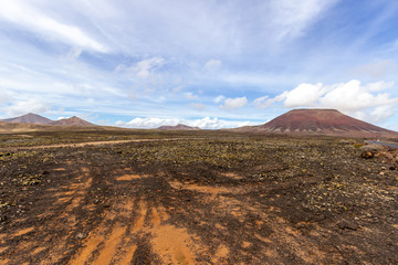 Scenic view at the volcanic landscape in the natural park of Corralejo (Parque Natural De Corralejo) on canary island Fuerteventura