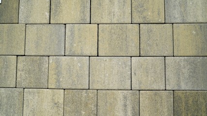 Obraz premium Natural stone wall texture. Rustic colorful surface floor pavement background. Texture tile