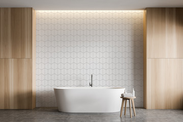 Fototapeta na wymiar White tile and wood bathroom interior with tub