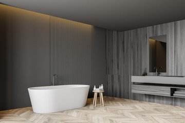 Gray and wooden bathroom corner, tub and sink