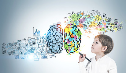 Little boy with marker, colorful brain sketch