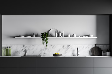 Gray countertops in white marble kitchen