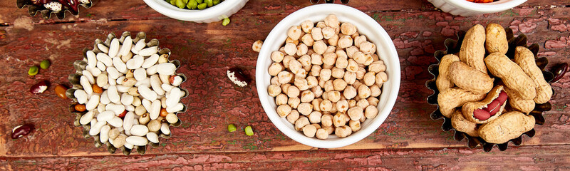Banner of Collection set of beans and legumes. Bowls of various lentils