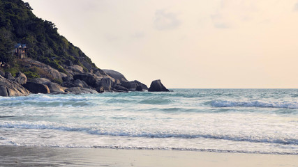 Fototapeta na wymiar Sea shore with waves at morning time