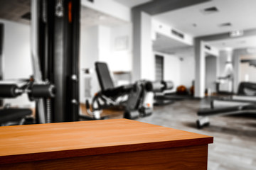 Desk of free space and gym interior 