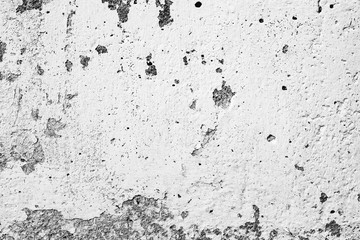 Texture of a concrete wall with cracks and scratches which can be used as a background