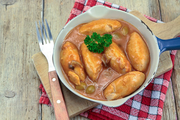 quenelles de volaille sauce aux olives