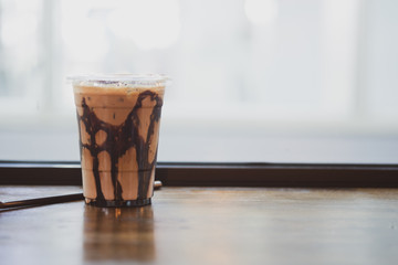 Delicious iced mocha in clear plastic glass
