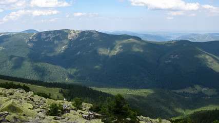 view of the Carpathian mountains on a sunny summer day from the top of Khomyak Mountain, Carpathians, Ukraine