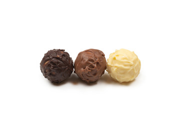 Chocolate truffle isolated on white background.