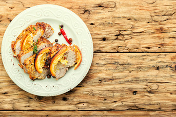 Baked meat in oranges