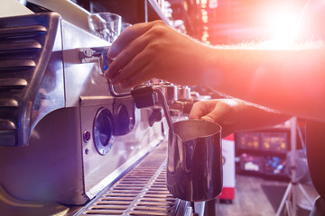 The bartender makes the coffee, cappuccino, cocoa, drink at the bar. Barista. Restaurant.