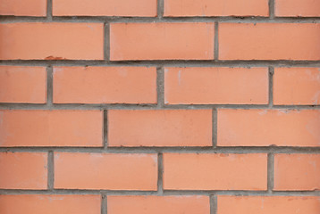 Red brick wall texture closeup