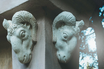 Stone decorative ram heads Ornamental animal heads nestled in a wall