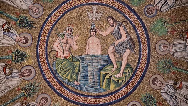 Ravenna, Italy, December 2019. Arian Baptistery. Fixed shot of the vault with the baptism of Christ. 