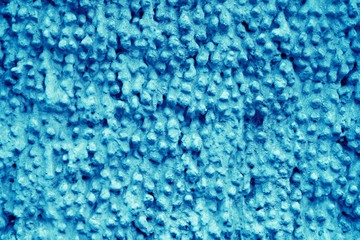 Fototapeta na wymiar Texture of plaster with drops with trendy colors - classic blue
