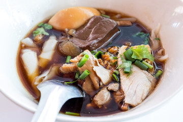 kuay jap, paste of rice flour ,boiled Chinese pasta square.. Chinese roll noodle soup .