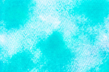 Abstract blue watercolor on white background.The color splashing in the paper.It is a hand drawn.