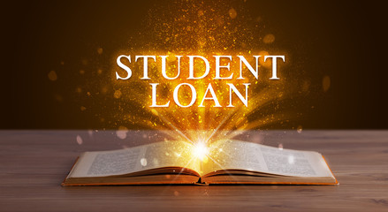 STUDENT LOAN inscription coming out from an open book, educational concept