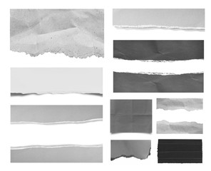 Set of old torn paper isolated on white background