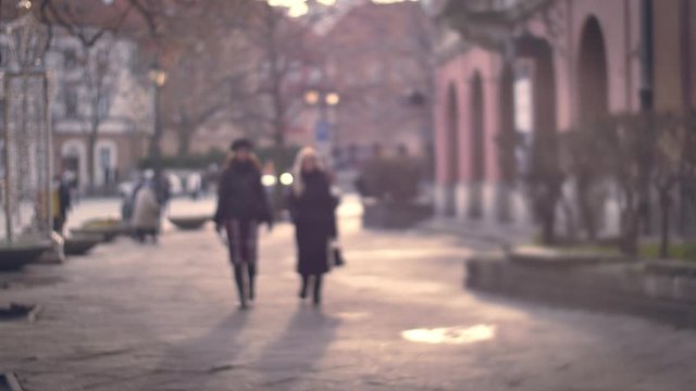 Unrecognizable people in the european city.