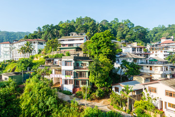 Beautiful builings on the green hills in the downtown, nex to the Kandy Lake or Kiri Muhuda or the...