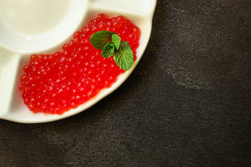 red caviar (seafood, salmon caviar) menu concept. food background. top view. copy space